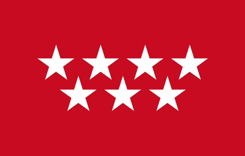 Bandera de la comunidad de Madrid: fondo rojo, 4 estrellas blancas arriba y tres más bajo.